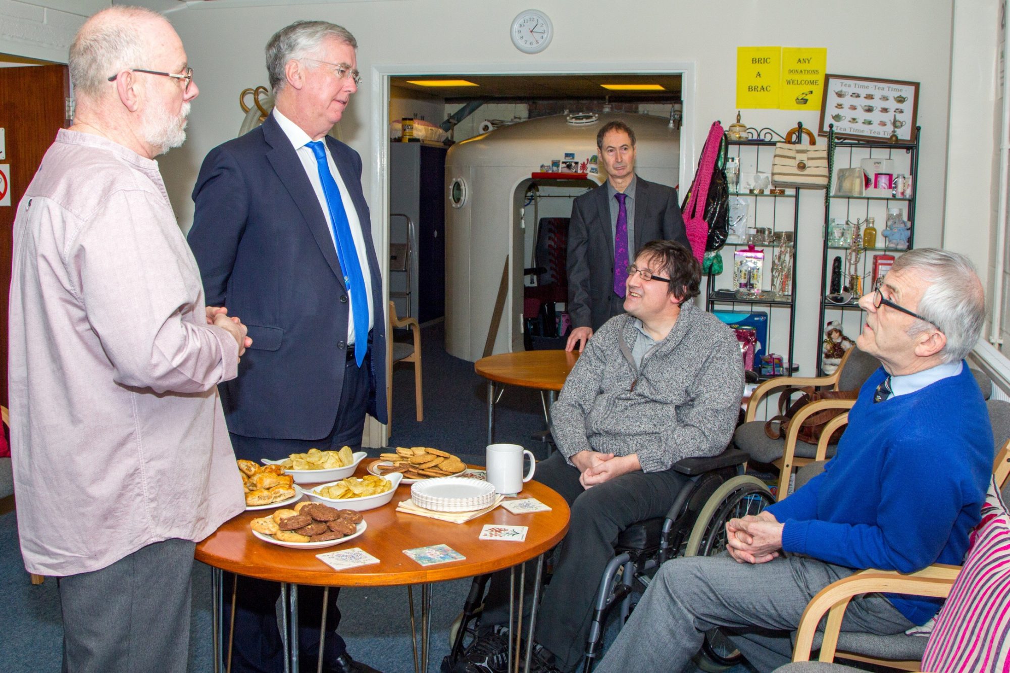 Michael Fallon 1 Mr Fallon chats with members of Swanley Therapy Centre