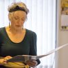 Lynne Nesbit reading her poetry at a lunch in 2015