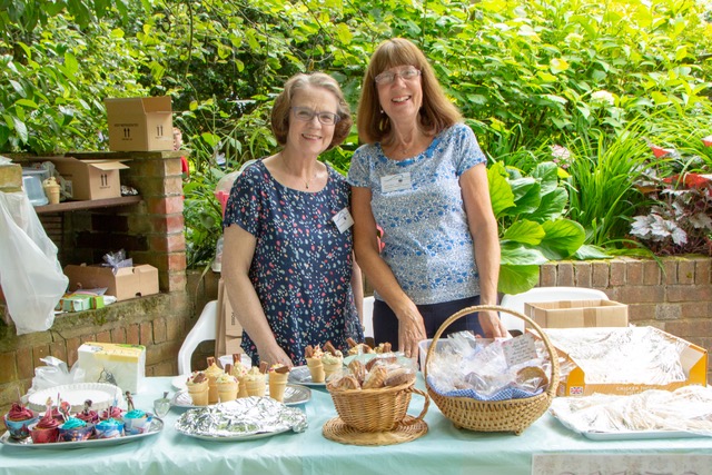 Volunteers Christine and Anne-Marie on the cake stall
